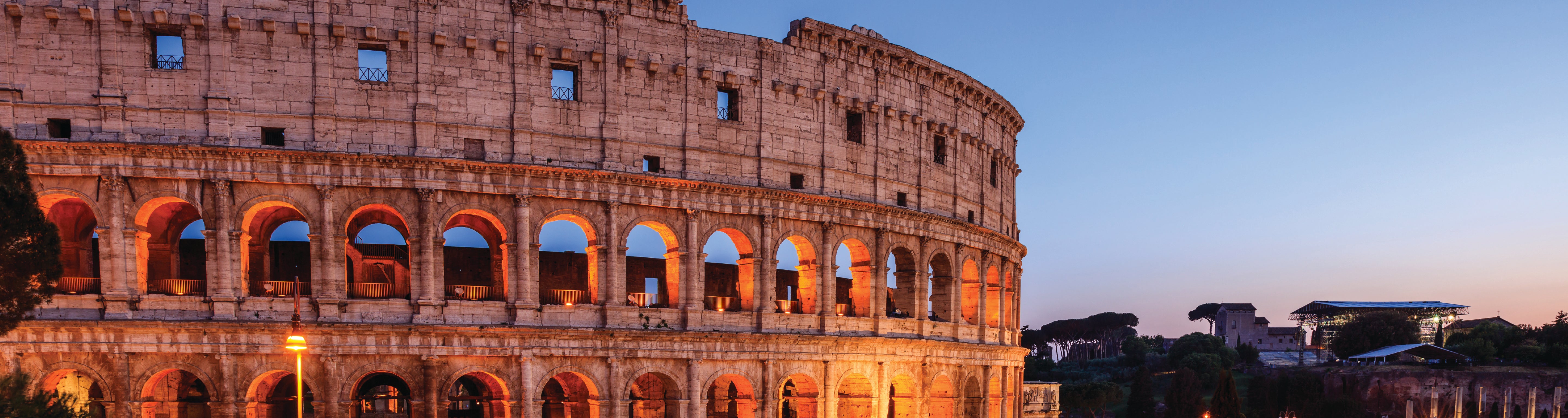 Dusk view of the Colosseum in Rome, Italy