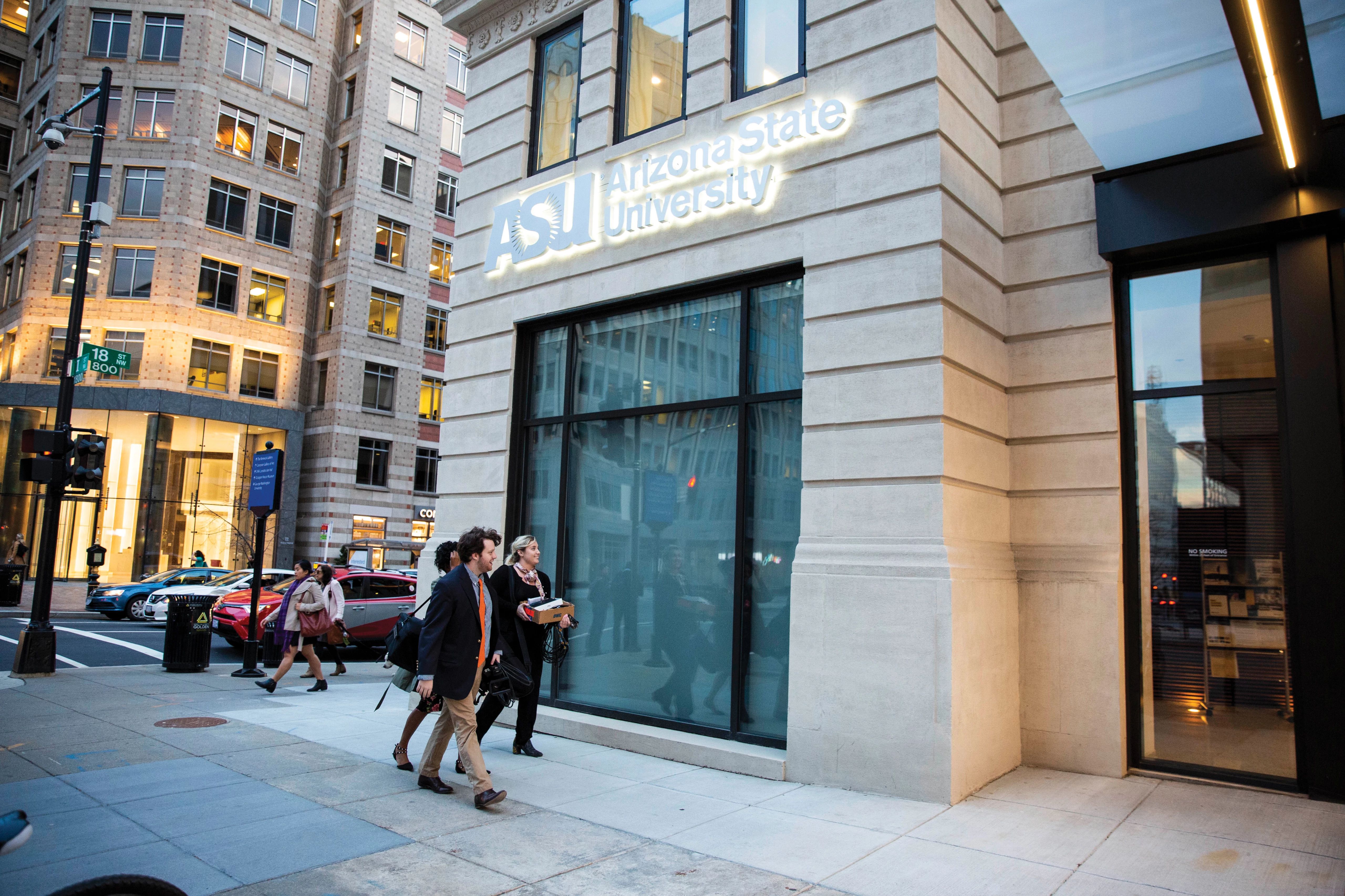 ASU students walking on the sidewalk in front of ASU's Washington, D.C. building