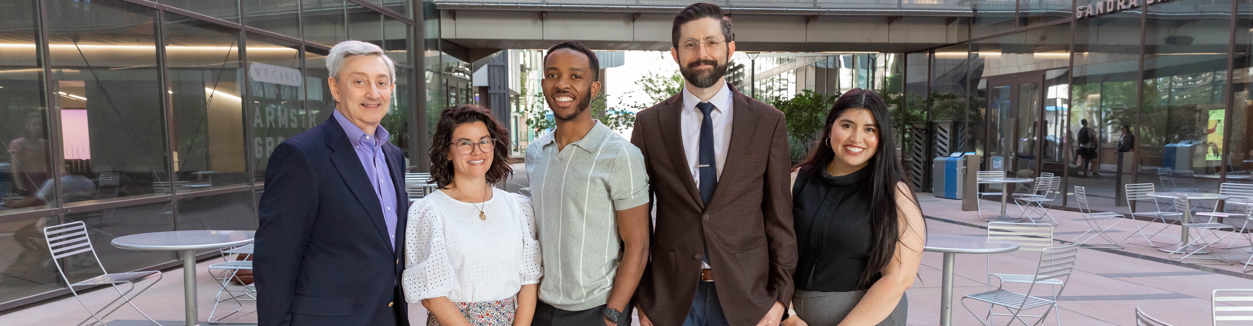 Five people standing outside of Beus Center for Law and Society during the Gold Society Annual Alumni Event 