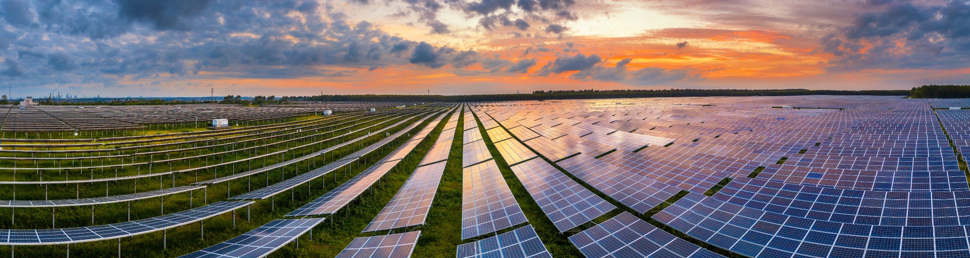 Aerial view of solar power panels in clean energy generating station.