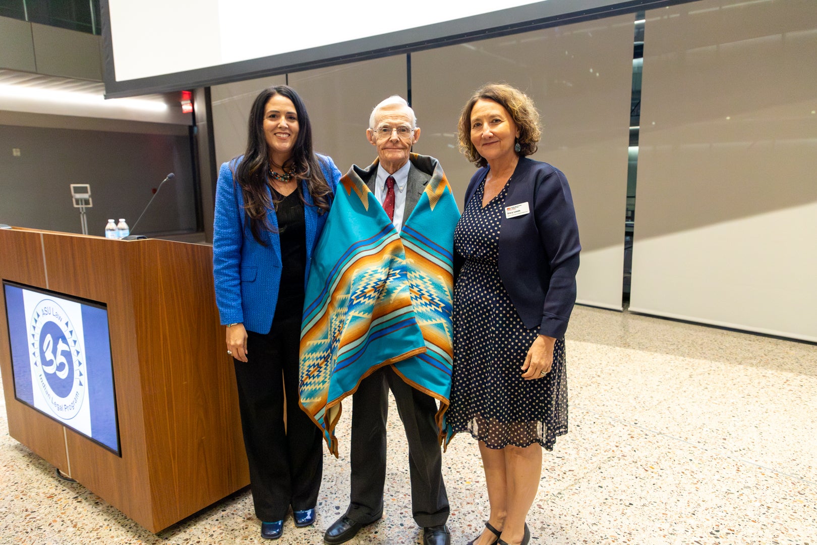 William Canby standing with Dean Leeds and Patty Ferguson-Bohnee during the annual William C. Canby Jr. Lecture. during the 
