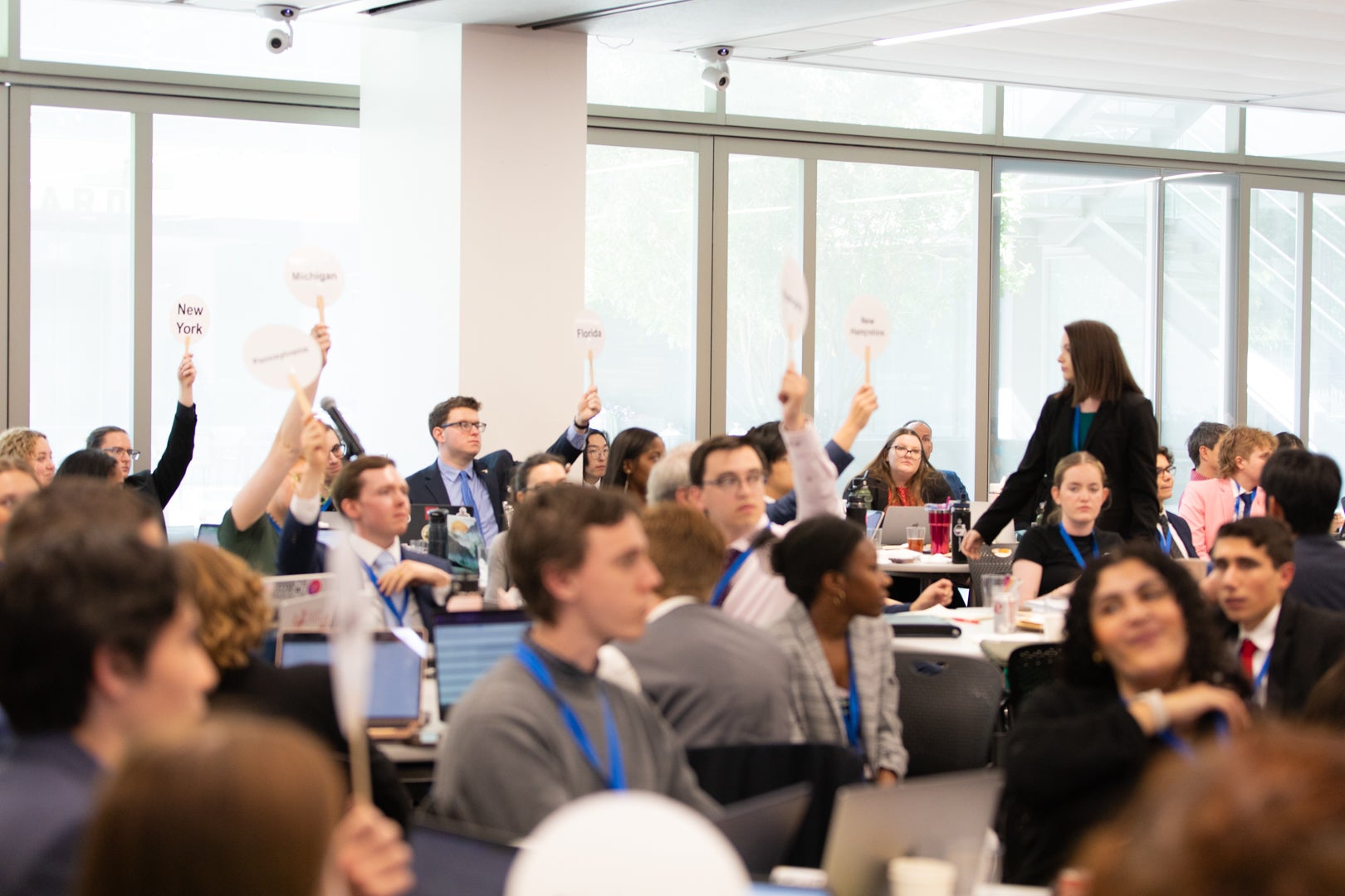 Students holding up paddles during the Model Constitutional Convention at ASU Law.