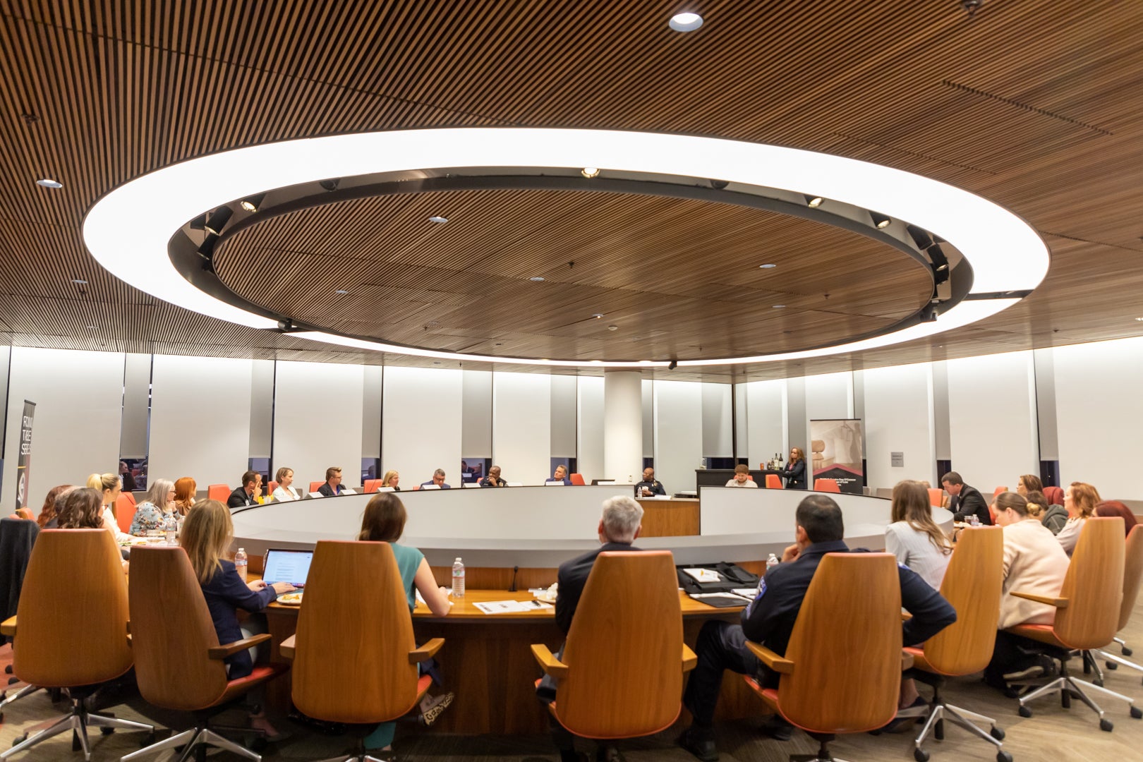 ASU Law professors and guest speakers sitting around a round table in the Dan Cracchiolo Executive Conference Center.