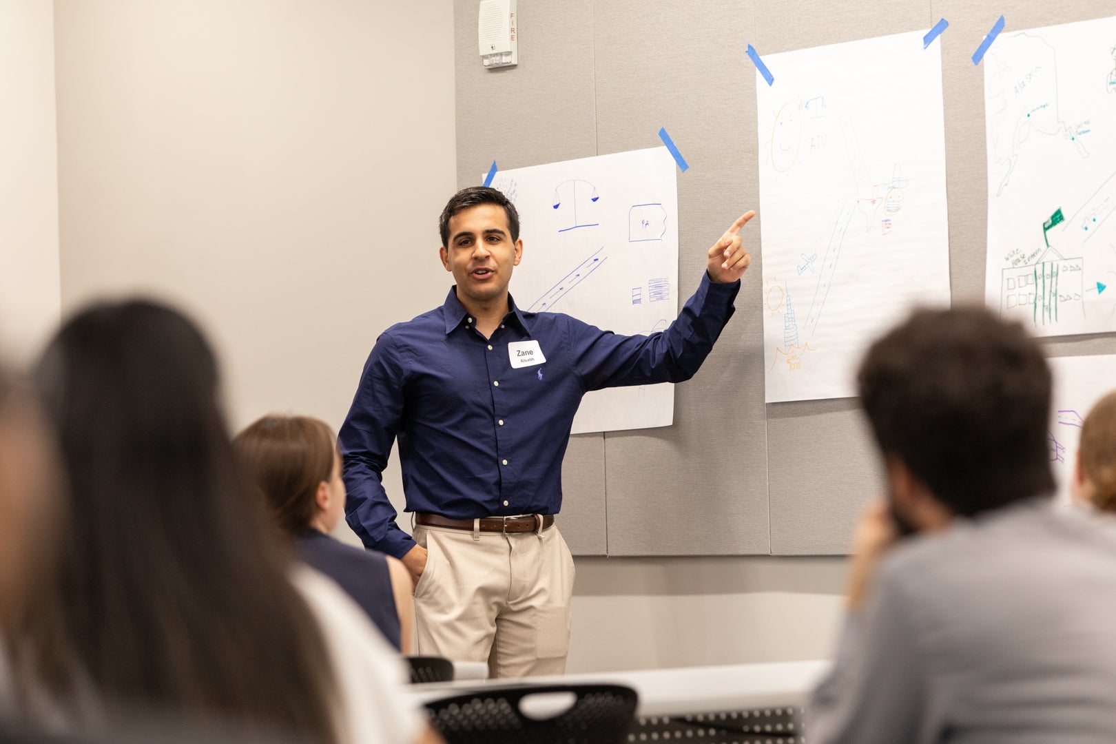 ASU Law student pointing and presenting to a class.