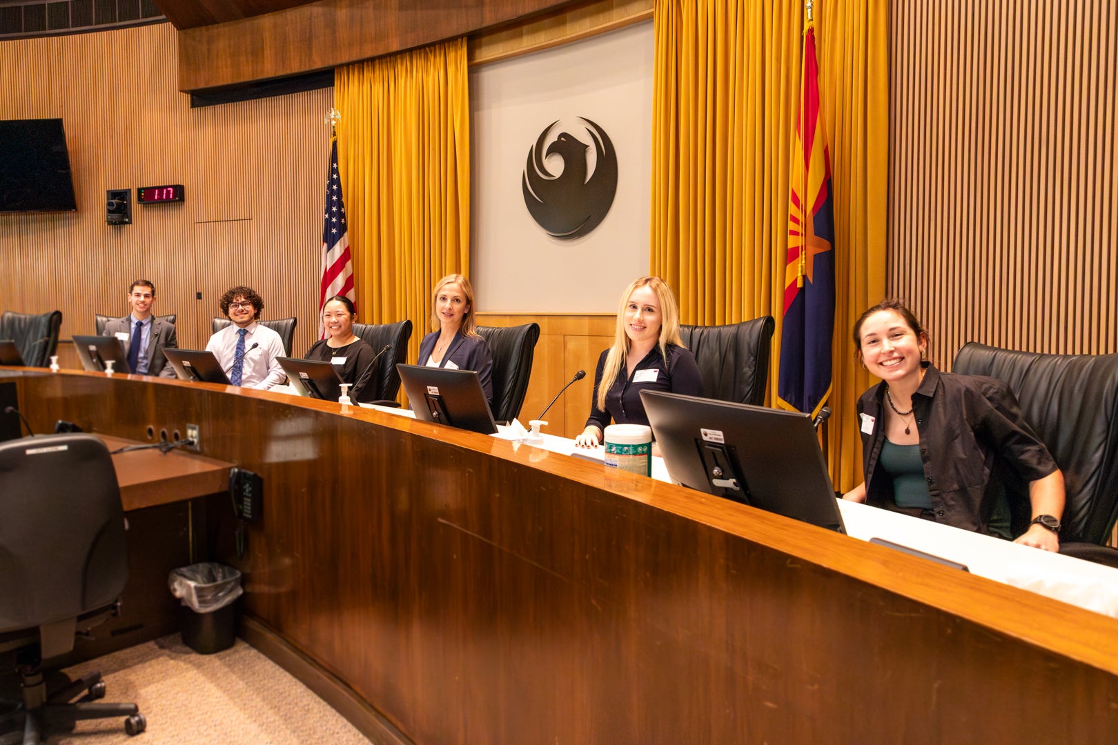 Student sitting at the Arizona State Court on the Judges bench.