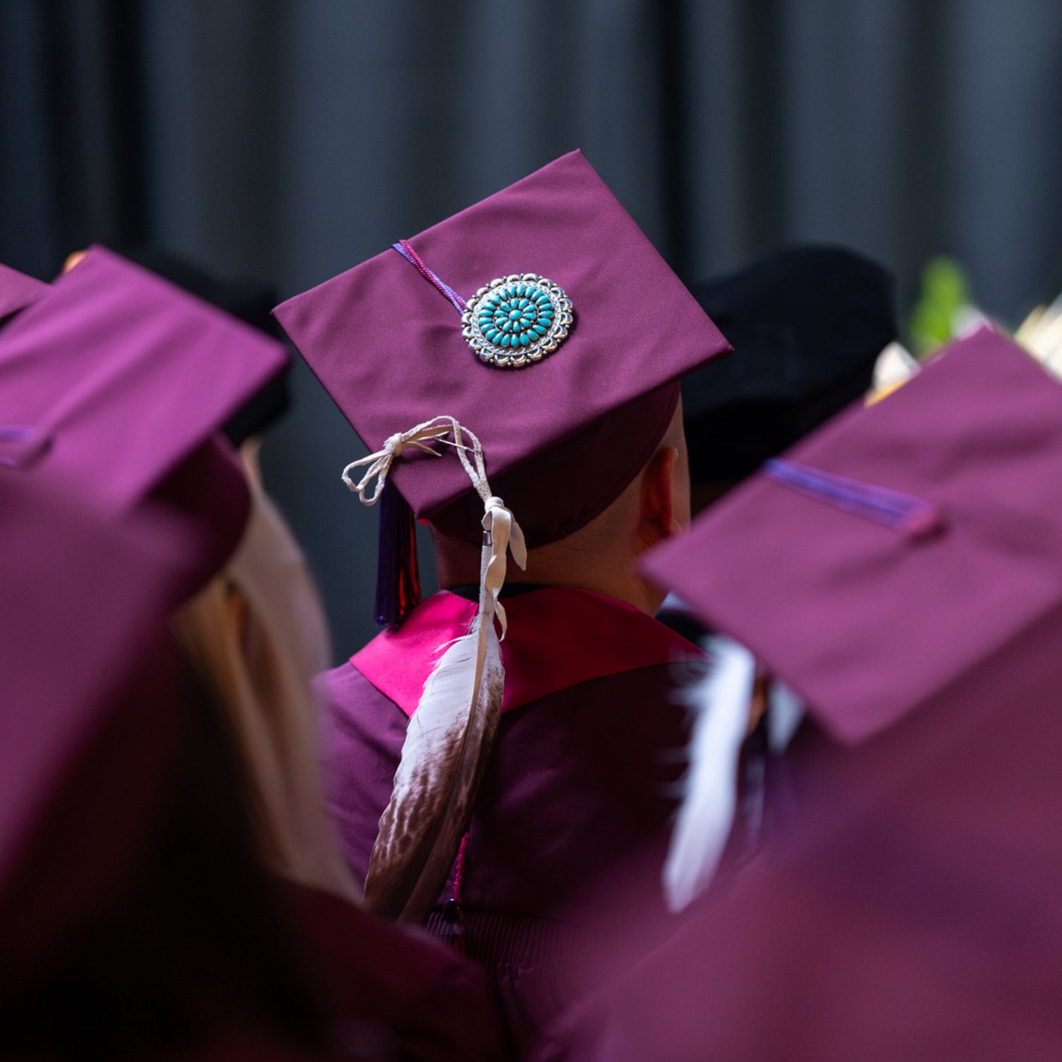 Decorated graduation caps at the Fall 2024 Convocation ceremony