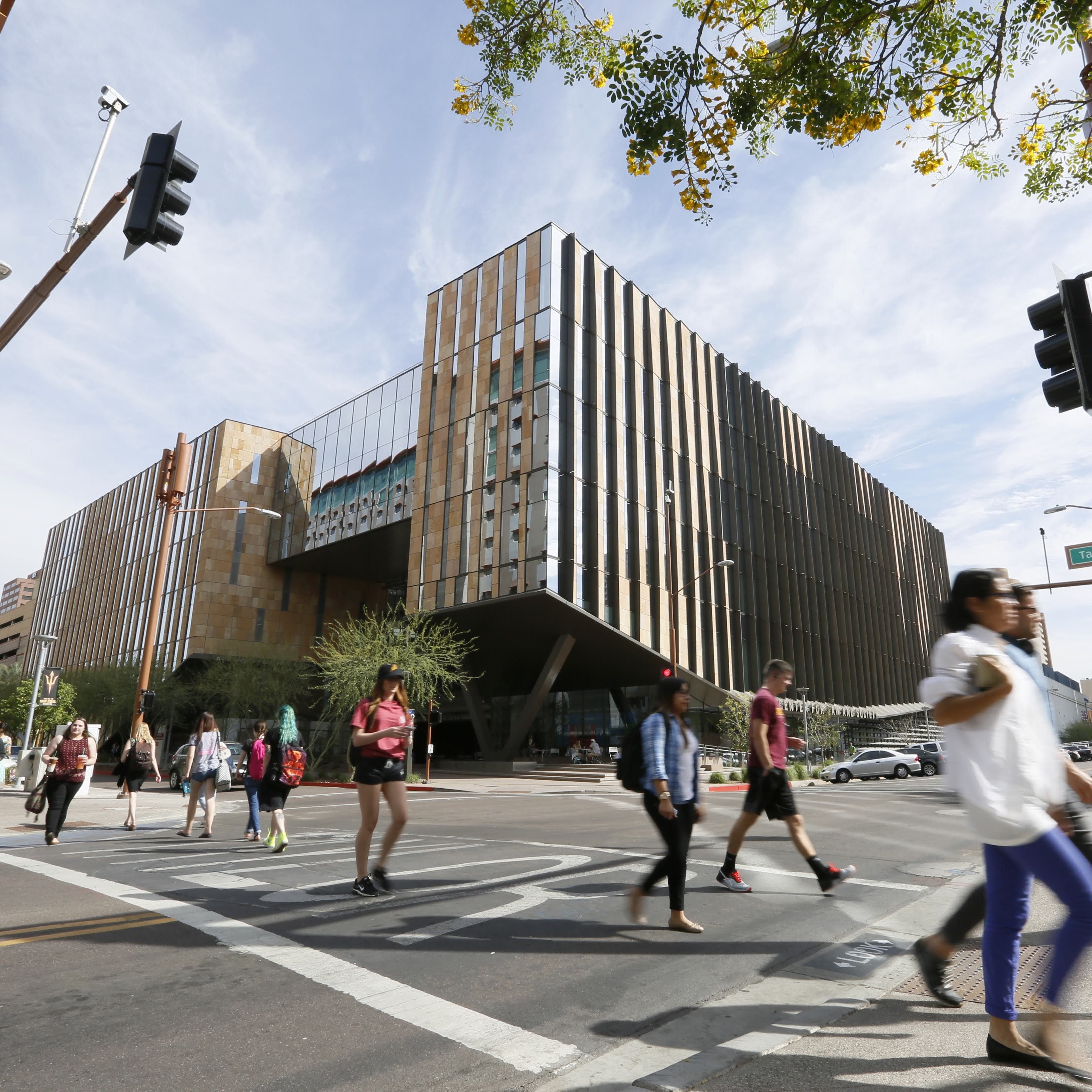 Students crossing the street outside of the Beus Center for Law and Society