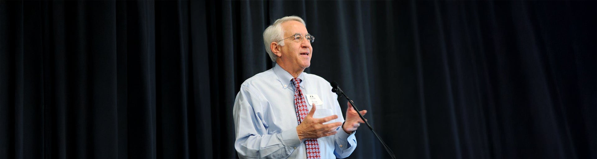 Bruce E. Meyerson speaks at a lecture