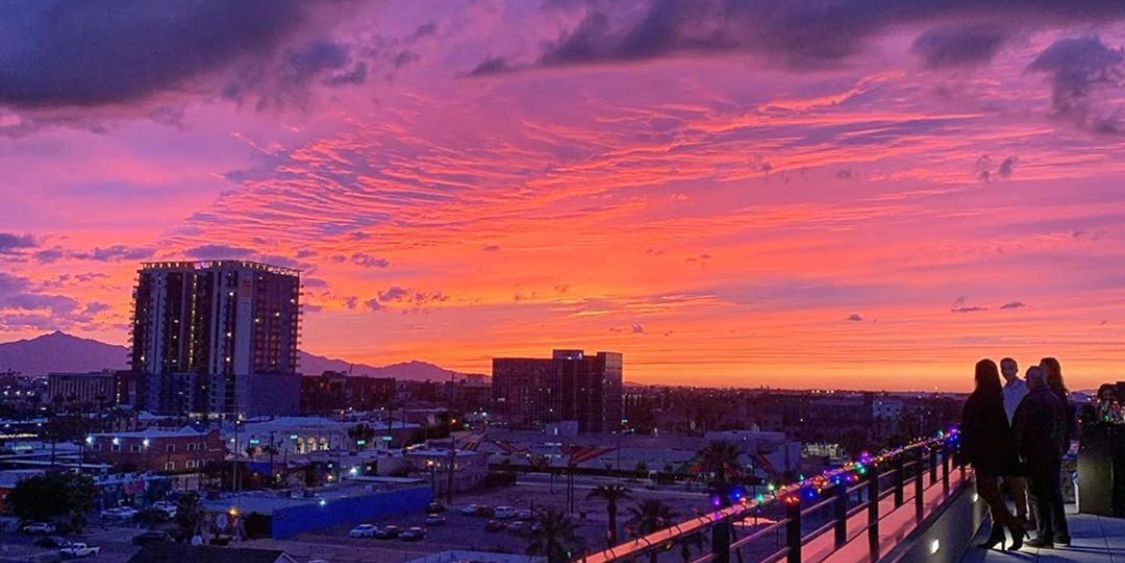 Phoenix downtown with a sunset behind it