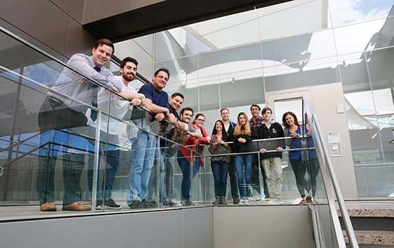 Clinic Students pose for shot on balcony stairs