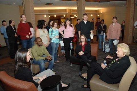 Justice O'Connor speaks to a group in conference lobby