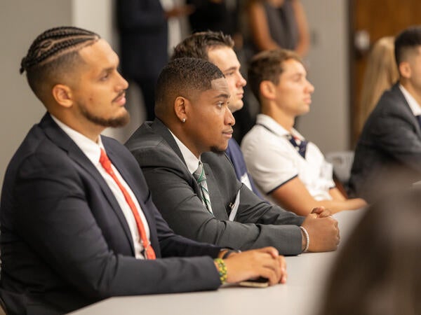 MSLB students sitting at a classroom table during the ASU Law Sports Law and Business orientation