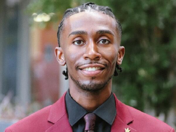 Editor’s note: This story is part of a series of profiles of notable spring 2024 graduates. Kurt “KJ” Russell Jr. had big dreams of playing in the NBA for his hometown Cleveland Cavaliers. Unfortunately, genetics had other plans for him. “Reality served up its own twist — leaving me at a height about as tall as a garden gnome and barely tipping the scales at 125 pounds,” he said, laughing. But watching his uncle work as an entertainment lawyer and hearing his stories turned Russell onto a new path — on