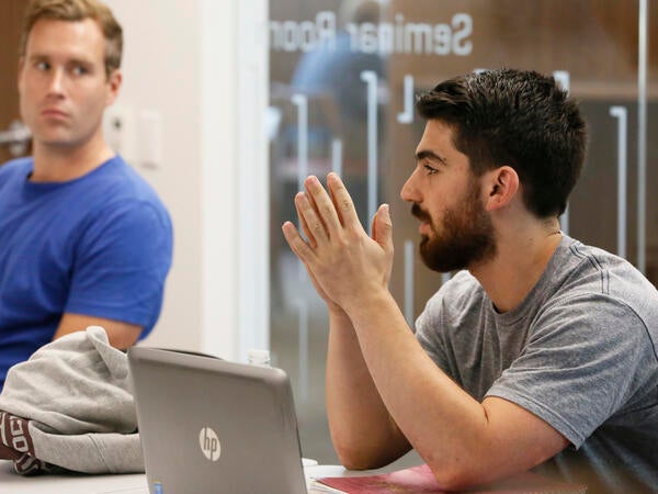 Students in discussion with each other