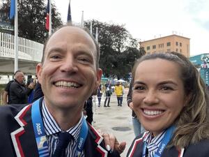 Rocky Harris (left), chef de mission for Team USA at the 2024 Olympic Games, runs into Arizona State University alum and tennis player Desirae Krawczyk at the opening ceremony on July 26. Harris is an ASU alum and the former chief operations officer for Sun Devil Athletics.