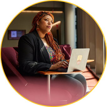An ASU Law student studies in the ASU Law Ross-Blakely Library