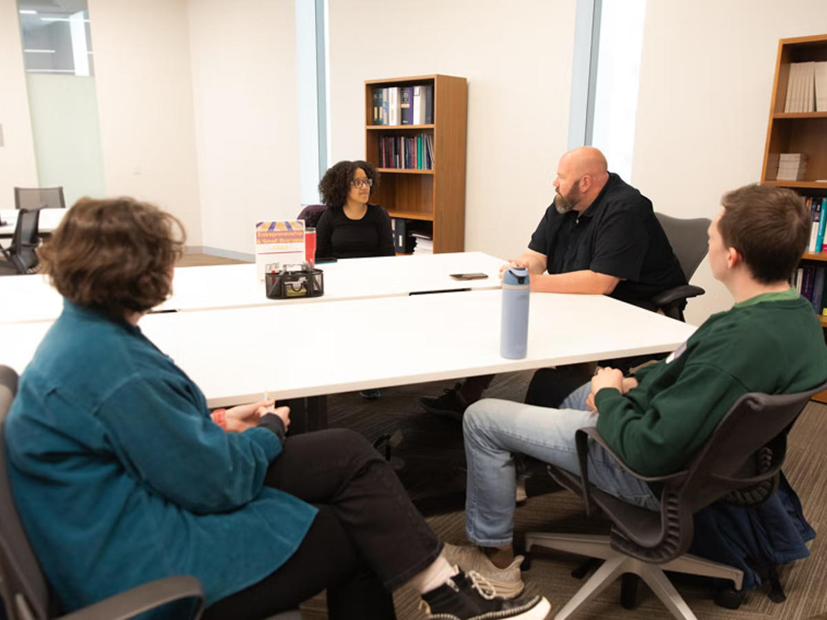 Students and instructor at the Entrepreneurship and Small Business Clinic 